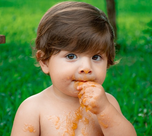 At first BLW can be very messy as the baby learns hand eye coordination and food-to-mouth motion