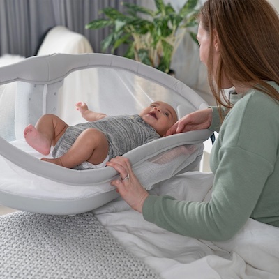 With a bedside bassinet you're able to comfort your little one without getting out of your bed