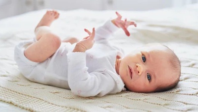 Moro Reflex causes baby to kick arms and legs before and during sleep